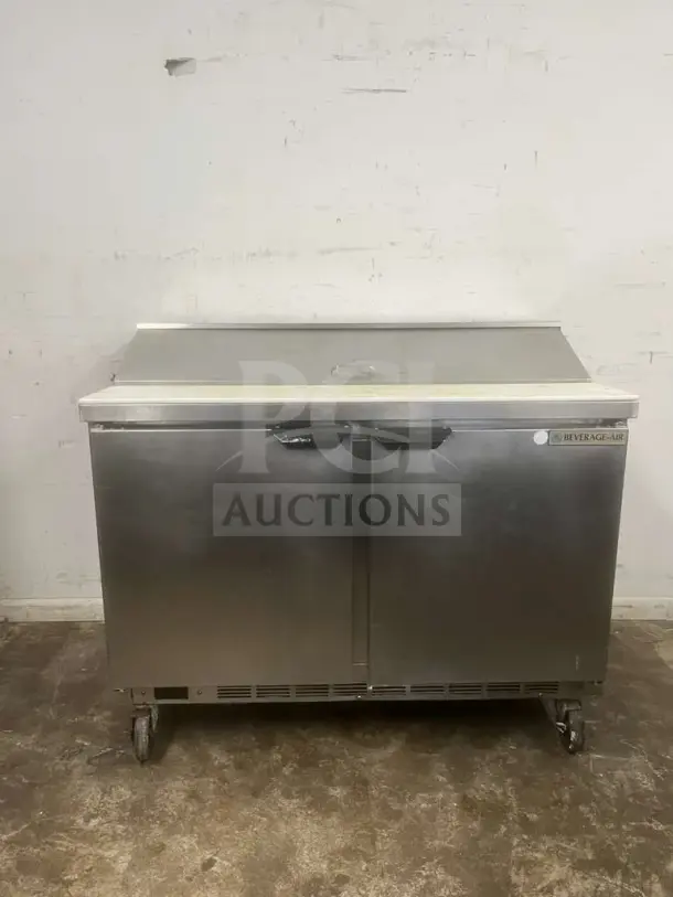 Beverage-Air 48" two-door sandwich prep table, stainless steel, model PREP TABLE, on casters, good condition.