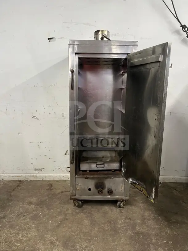 Universal Smoker Stainless Steel Oven, 78" with galvanized interior, 3 burners, model SMOKER, showing signs of use.