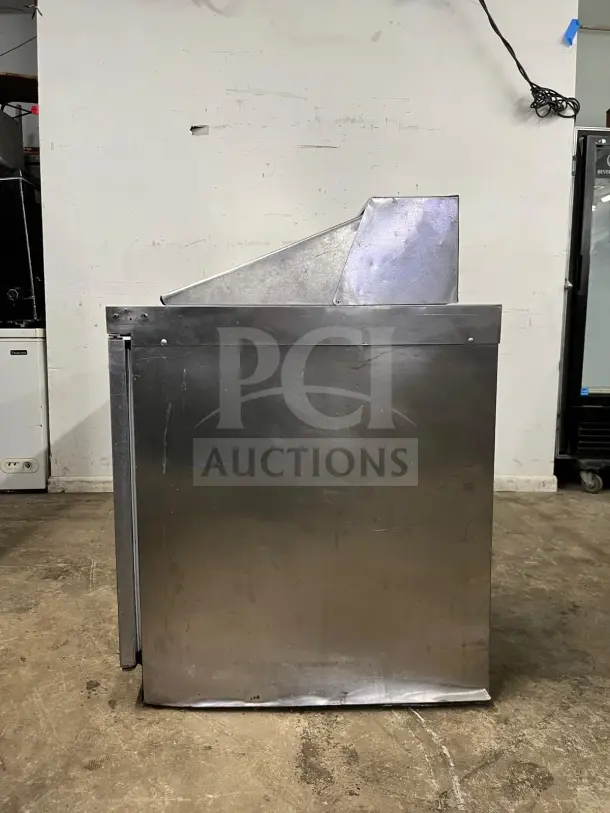 72" stainless steel sandwich/salad prep table with mega top and refrigerated base, model preptable, in used condition.