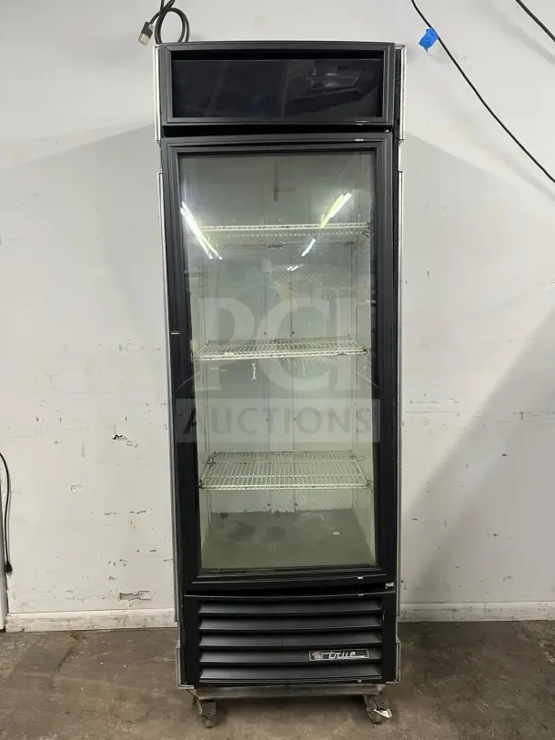 True GDM-26 Snapple merchandiser refrigerator, 30" wide, single glass swing door, brand label on front, used condition.