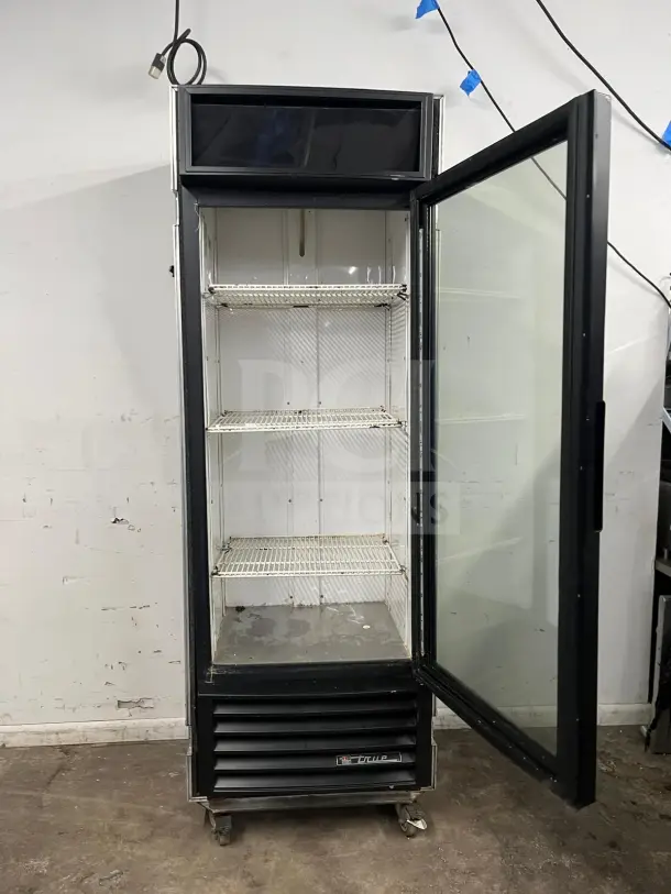 "Snapple" True GDM-26 30" glass door merchandiser refrigerator, used, with wire shelves, visible True logo on lower front.
