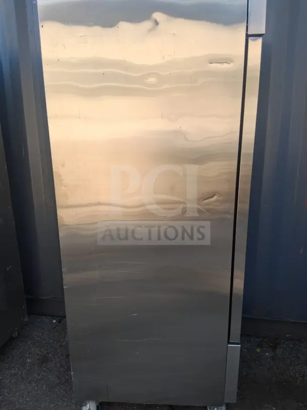 Dukers D28R reach-in refrigerator with a right hinge solid door, stainless steel exterior, 115v, minor surface marks.