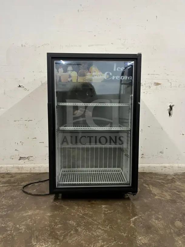 White countertop display ice cream freezer with glass door, excellent condition, shelving visible, and "Ice Cream" label on top.