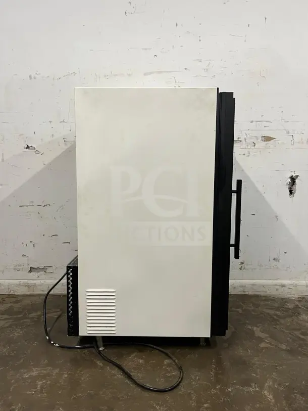 White countertop display ice cream freezer with a glass door, in amazing condition. Model DISPLAY. Visible power cord and ventilation panel.