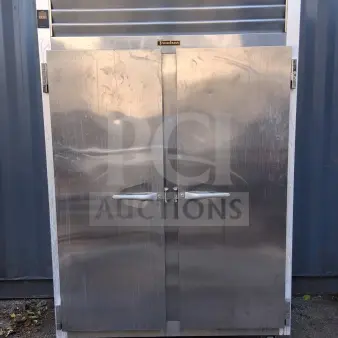 Traulsen G20010 52" G Series solid door reach-in refrigerator with left/right hinged stainless steel doors. Slight wear visible.