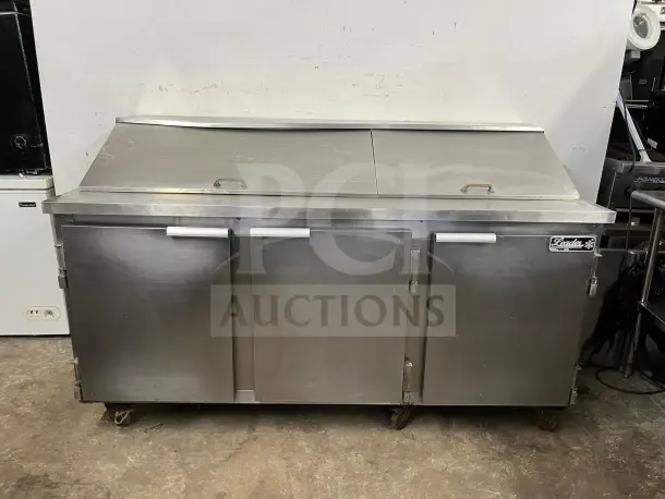 LEADER NSFM72 72" 3-door mega top bain marie refrigerated prep table, stainless steel, with handles and LEADER logo.