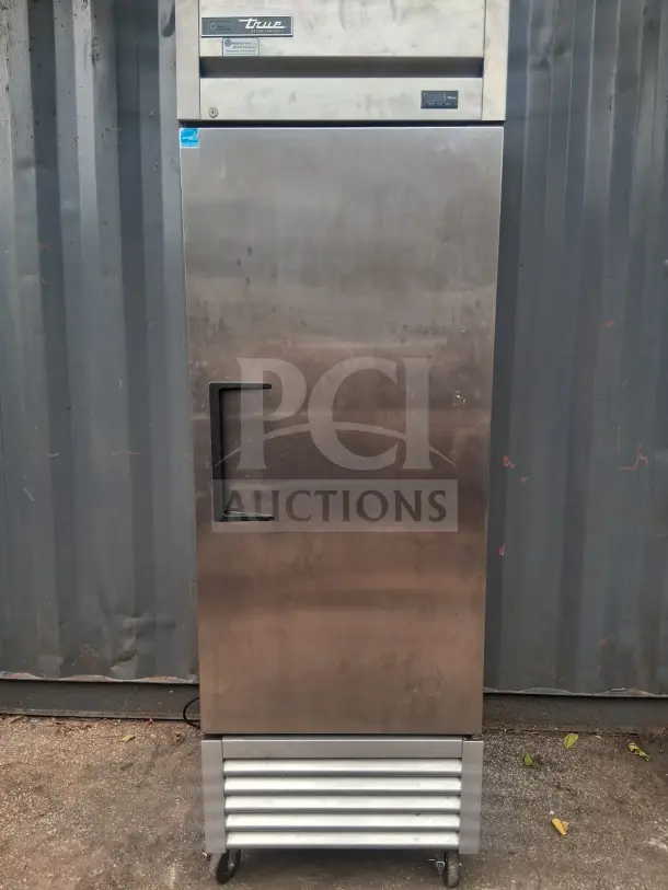 True T-23-HC 27" Solid Door Reach-In Refrigerator; stainless steel, single door, used, casters, True logo visible.