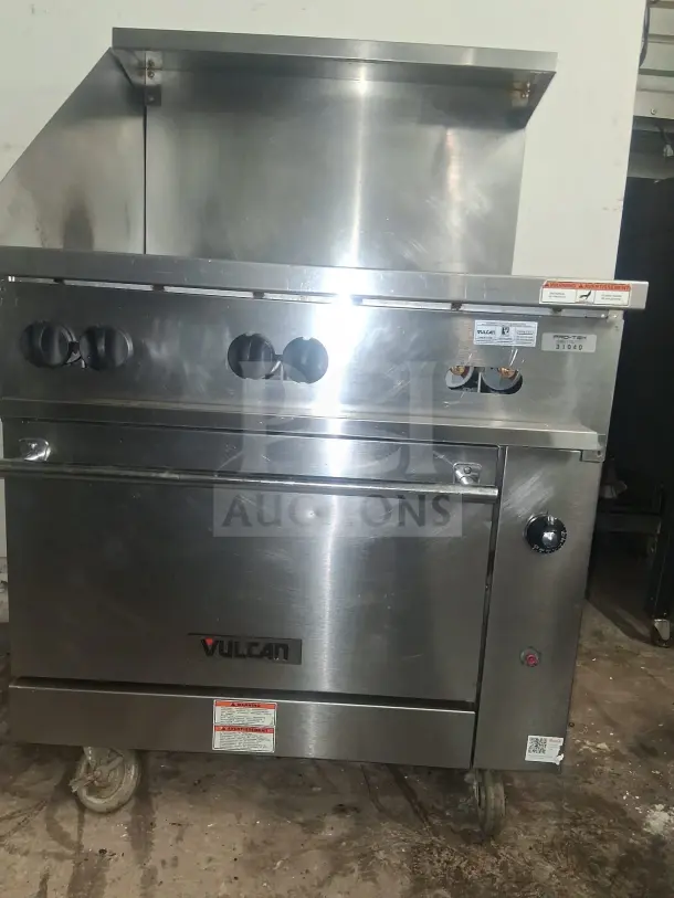 Vulcan 36C-6BN Endurance natural gas range, stainless steel, with six burners, visible control knobs, and brand labels.