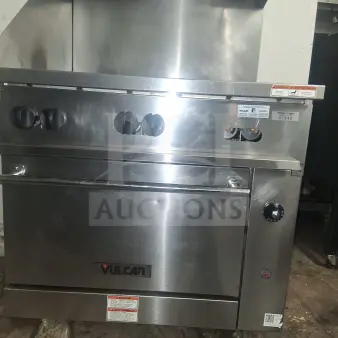 Vulcan 36C-6BN Endurance natural gas range, stainless steel, with six burners, visible control knobs, and brand labels.