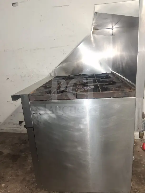 Vulcan 36C-6BN Endurance natural gas range with six burners, stainless steel exterior, used condition.