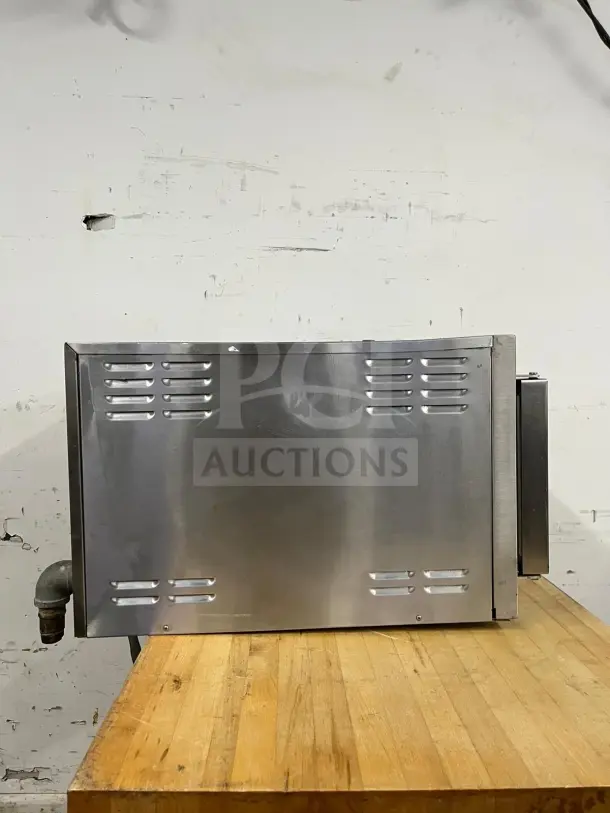 Cleveland 21CET8 Steamcraft countertop convection steamer, stainless steel, three-pan capacity, used condition.