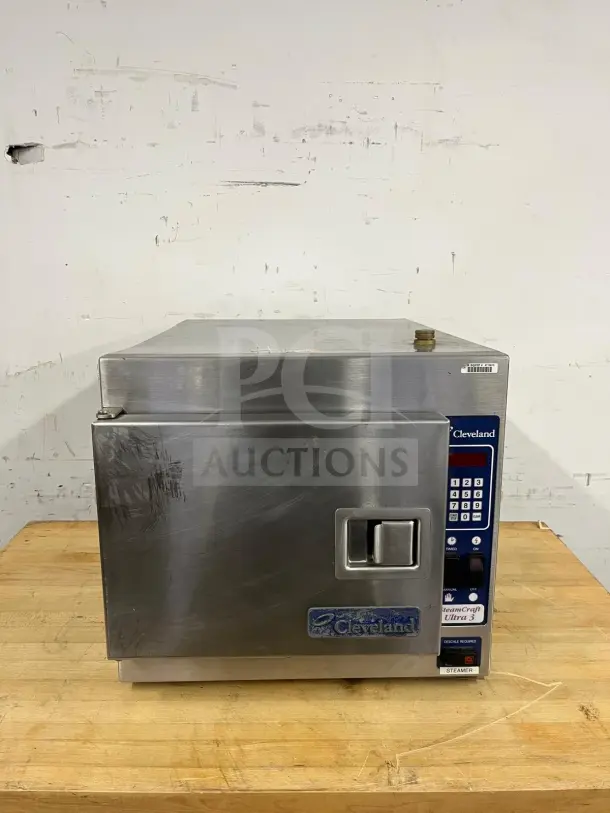 Cleveland 21CET8 Steamcraft® countertop steamer, stainless steel, 3-pan capacity, visible control panel, used condition.