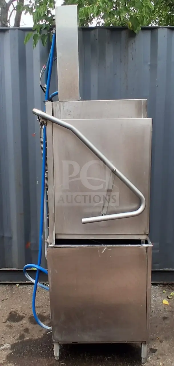 Champion DH5000T Door-Type High Temperature Tall Hood Dishwashing Machine; stainless steel, tall hood, used condition.