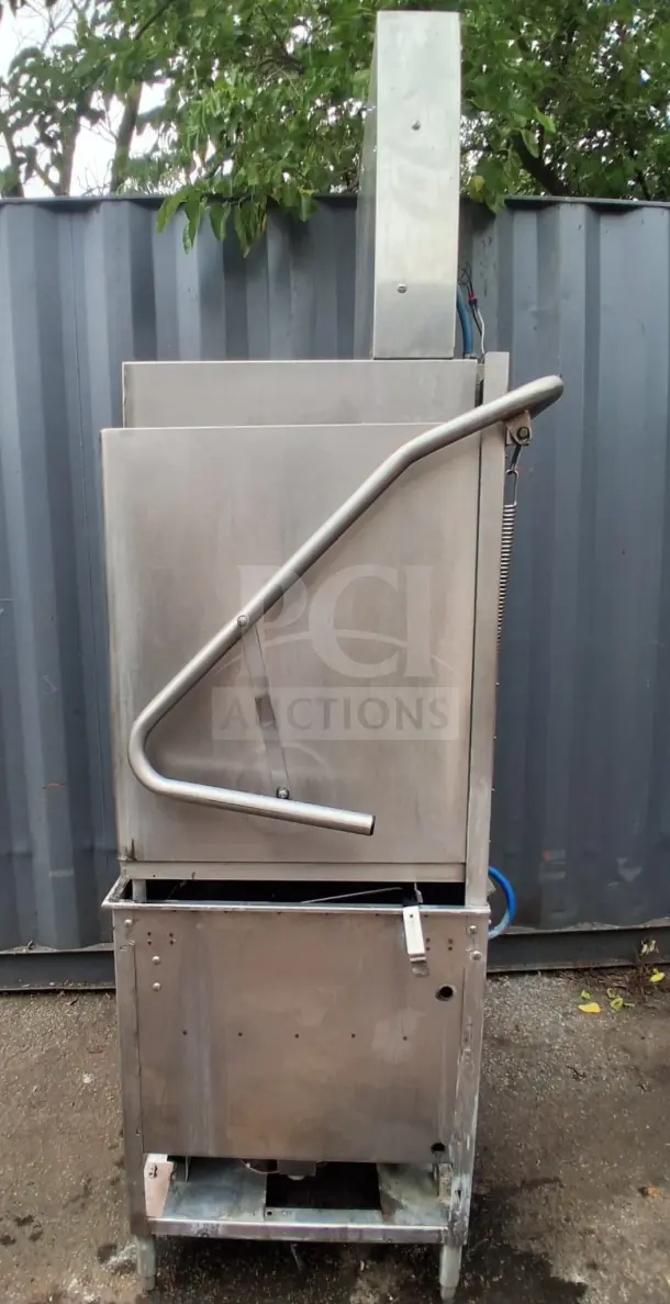 Champion DH5000T Door-Type Tall Hood Dishwashing Machine, stainless steel, used condition, visible plumbing connections.