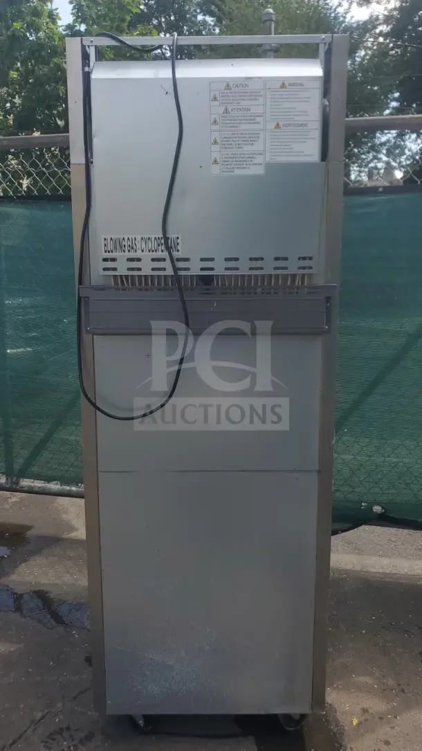 Refrigeration-X XF19-1-N reach-in freezer, right hinge solid door. Caution labels visible. Measures 25 1/4", 115V.