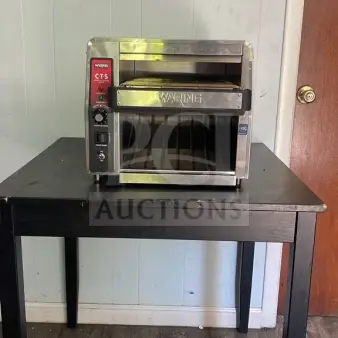 Waring CTS1000 Commercial Conveyor Toaster, 120V, stainless steel, durable design, visible controls, good used condition.