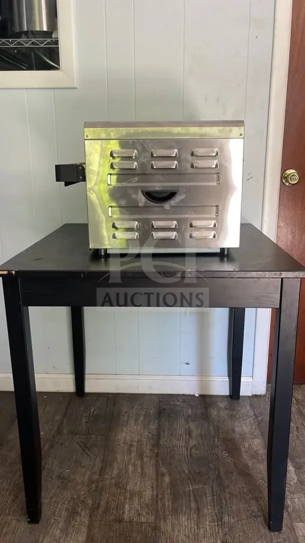 Waring CTS1000 Commercial Conveyor Toaster, stainless steel, 120V, used condition, front vent and control handle visible.