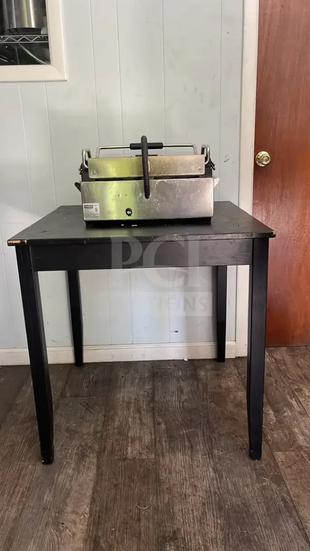 Waring WPG250TB Panini Supremo grill with grooved top, 14.5"x11" surface, timer. In used condition on display table.