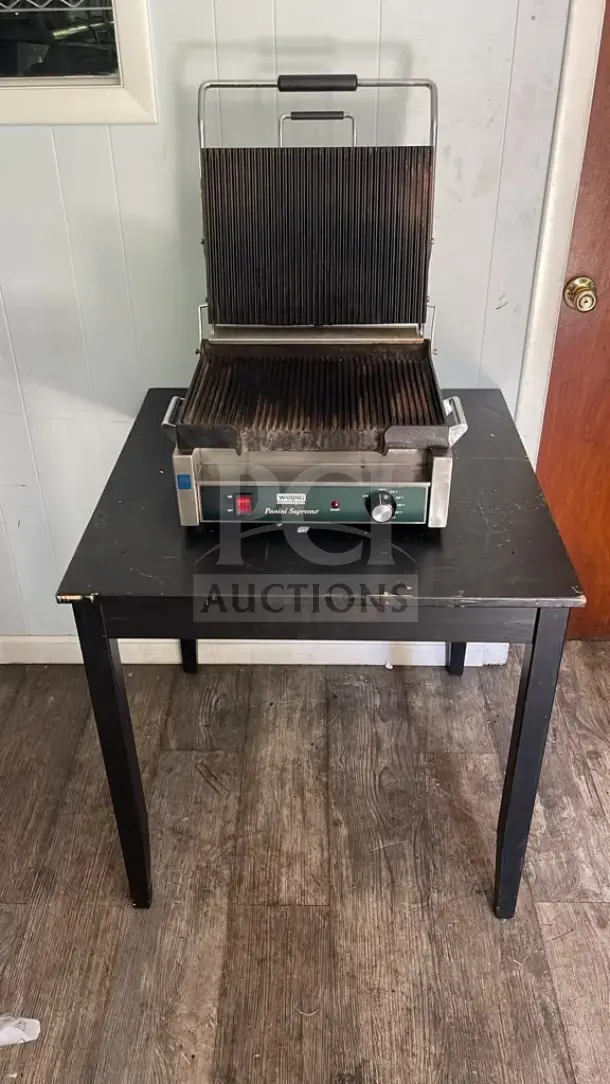 Waring WPG250TB Panini Supremo grill with grooved plates, timer, 14.5" x 11" surface, in used condition.