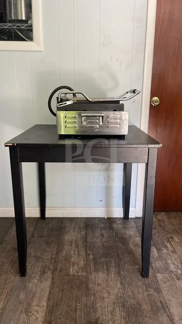 Waring WPG250TB Panini Grill with grooved plates on a table, great condition, 14 1/2" x 11" surface, 208V, 2808W.