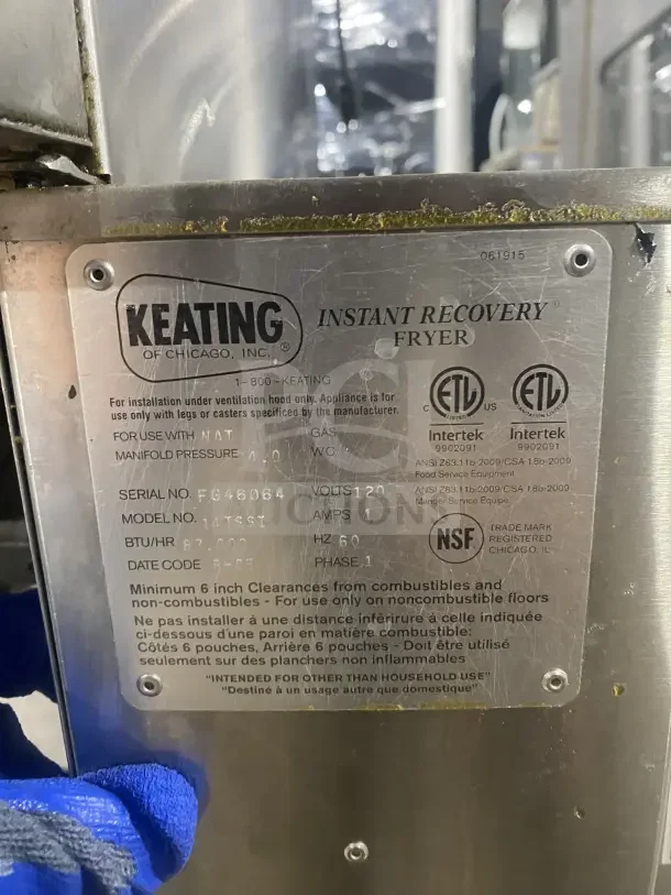 Keating stainless steel dual instant recovery fryer, Model 14TSSI, with heating element, back splash, on casters. Serial FE46064.