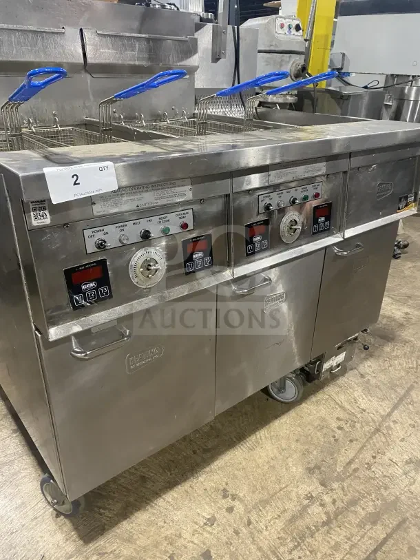 Keating 14TSSI stainless steel dual instant recovery fryer, natural gas, with heating element, back splash, on casters.