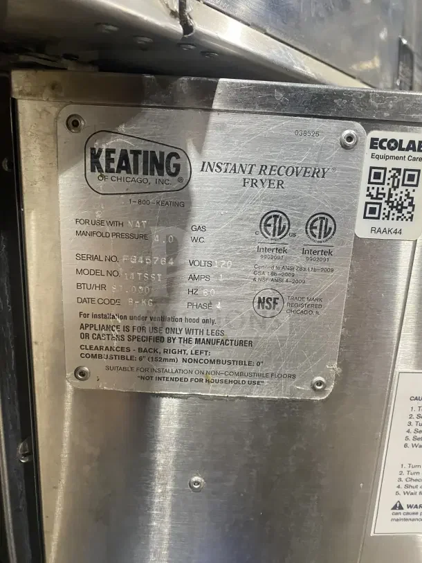 Keating stainless steel dual instant recovery fryer, model 14TSSI, 120V 4 phase, on casters, with backsplash, SN: FG45764.