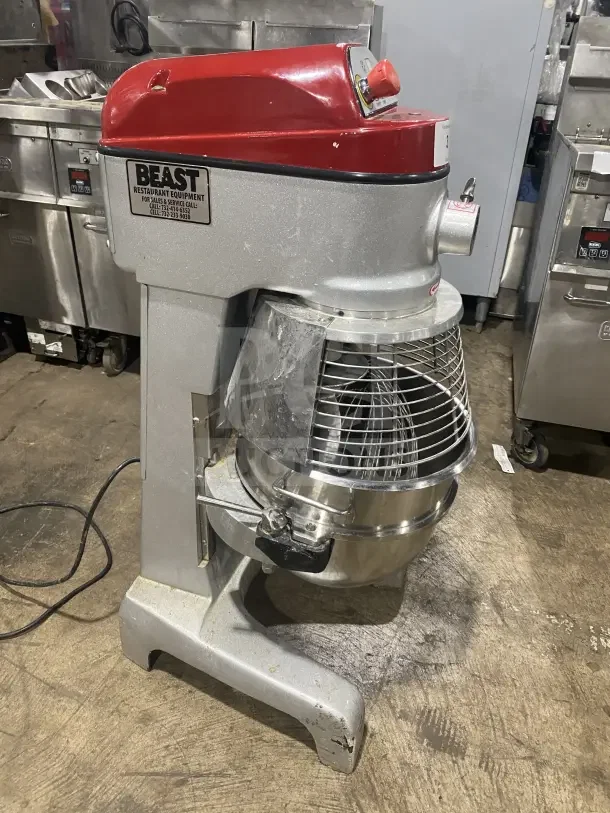 Axis AX-M30 30 Qt. Planetary Mixer with stainless bowl guard and spiral dough hook. Visible wear, heavy-duty commercial model.