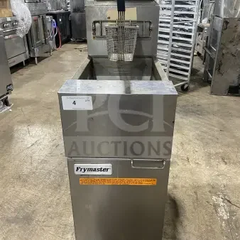 Frymaster commercial stainless steel gas fryer with backsplash, basket hanger, and fry basket. On casters, used condition.
