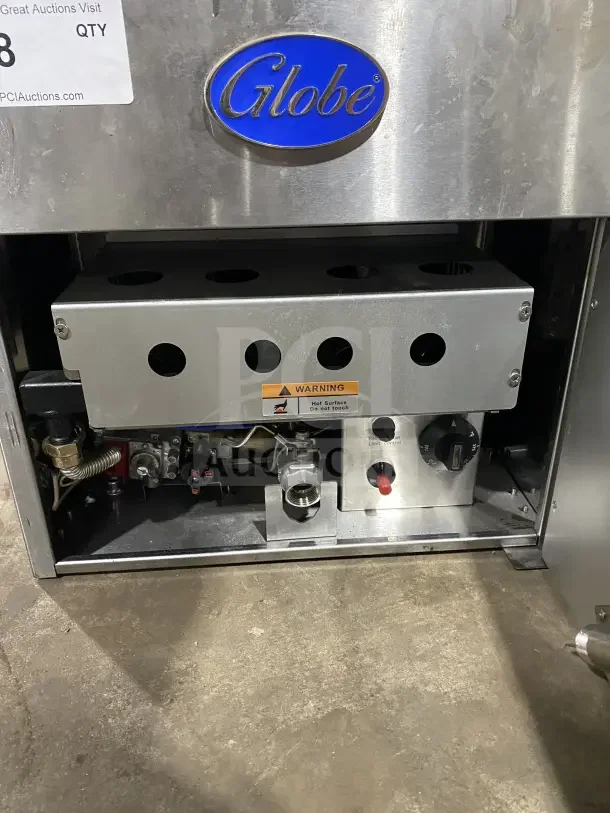 Globe GF30G stainless steel countertop deep fat fryer, natural gas, with backsplash, basket hanger, and fry baskets, in good condition.