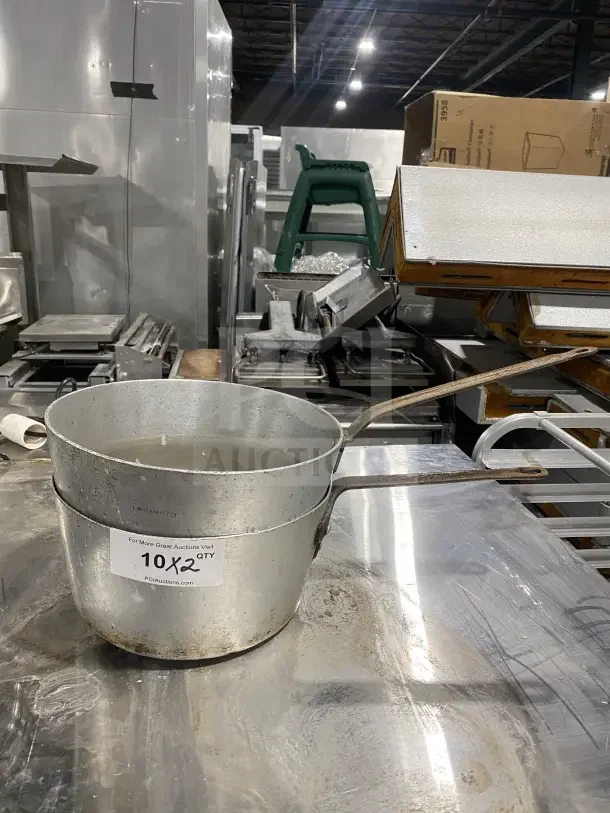 L&G commercial aluminum tapered sauce pans with heavy duty handles, showing signs of use; label reads "10 x 2 QTY".