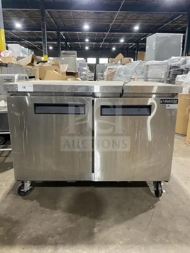 Dukers DUC48F stainless steel 2-door refrigerated lowboy freezer on casters, includes poly coated rack, 115V, 1 phase.