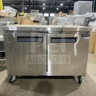 Dukers DUC48F stainless steel 2-door refrigerated lowboy freezer on casters, includes poly coated rack, 115V, 1 phase.