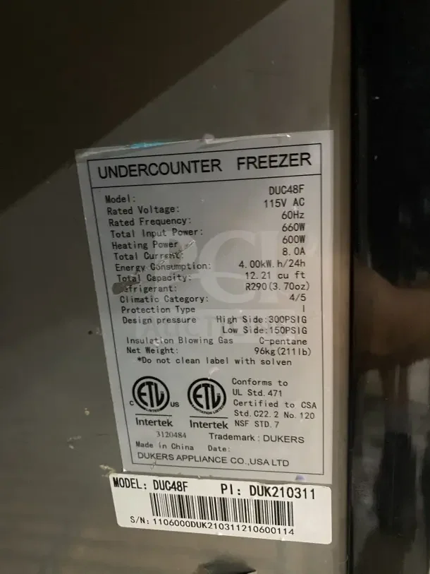 Dukers 2-door refrigerated lowboy/worktop freezer, model DUC48F, stainless steel, poly-coated rack, 115V, on casters.