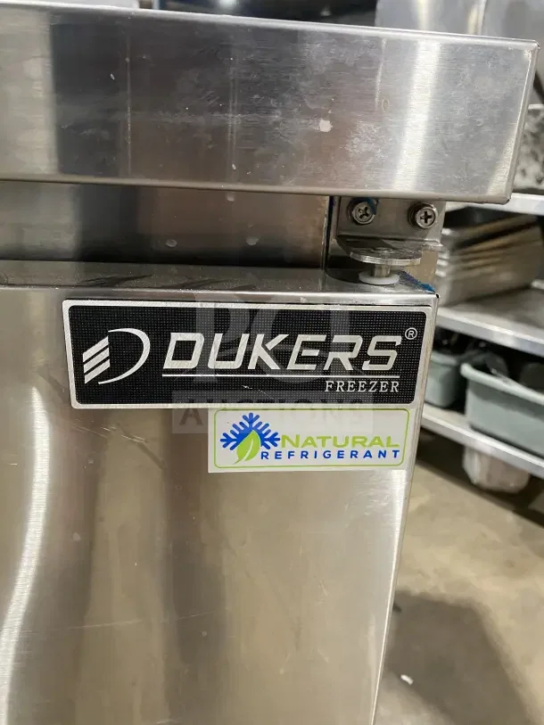 Dukers 2-Door Refrigerated Lowboy/Worktop Freezer, Model DUC48F, 115V, stainless steel, with poly-coated rack and natural refrigerant label.