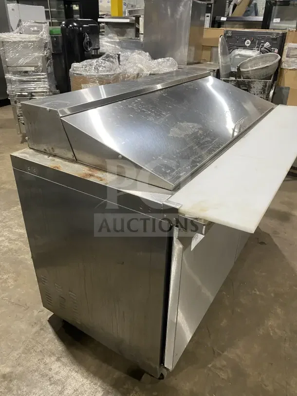 Supera PS61MTHC stainless steel 2-door refrigerated pizza prep table on casters, some surface wear, 115V 1Phase.