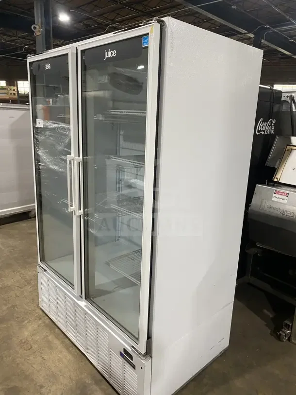 Master Bilt BMG-48 2-door reach-in freezer, glass front, poly-coated wire rack, model BMG-48, SN: 158572ICC01, used condition.