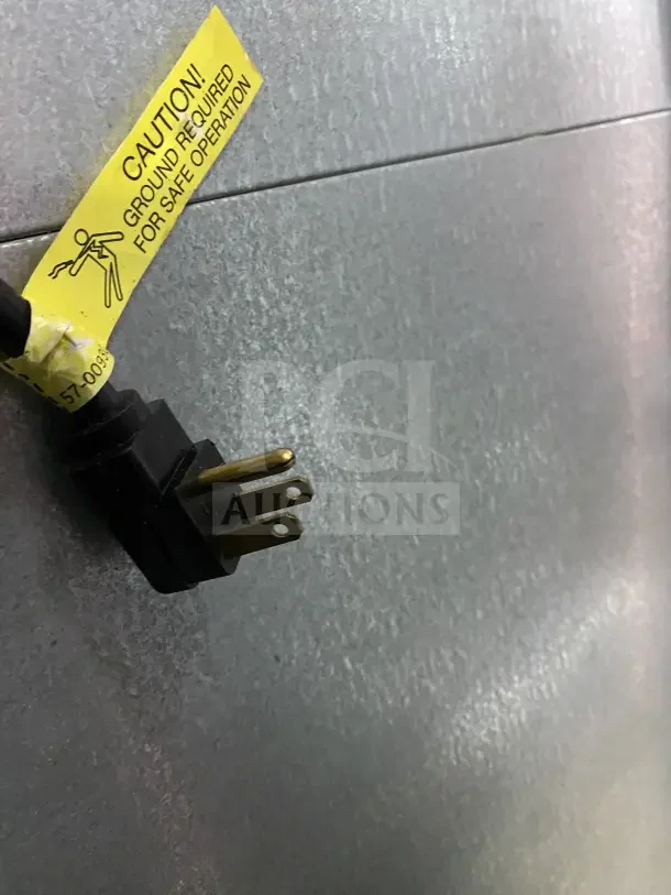 Master Bilt BMG-48 freezer plug with caution tag, indicating ground required for safe operation.