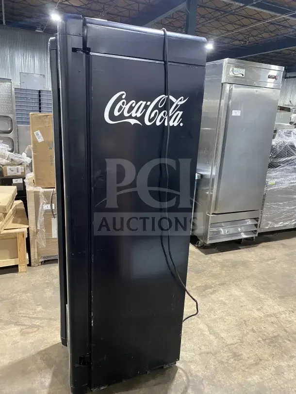 Imbera VR09CC CO12 commercial black single glass swing door merchandiser refrigerator with poly-coated wired rack, Coca-Cola branding.