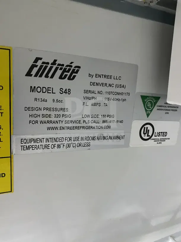 Entree Model S48 label showing serial number 1107CONH01175, UL listing, operating voltage, and design pressures.