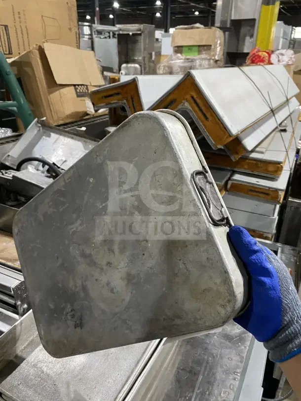 Commercial stainless steel baking tray, used condition, features reinforced handles, durable for high-volume baking.