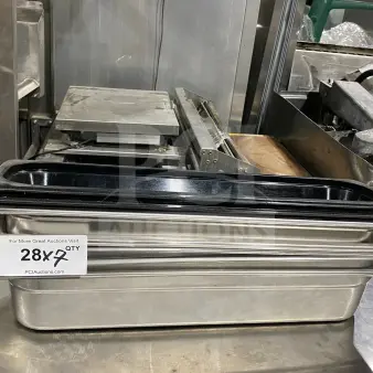 Commercial stainless steel heavy-duty prep trays, ideal for cinnamon rolls or salads. Multiple units available.