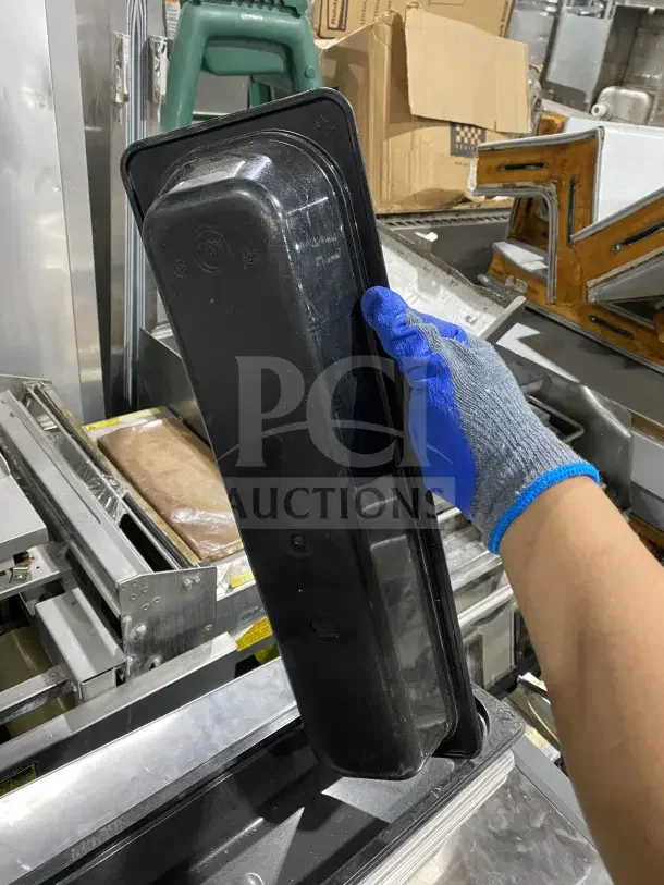 Commercial stainless steel prep tray, heavy duty, suitable for cinnamon rolls or salads, shown in used condition.