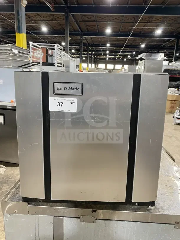Ice O Matic Elevation Series 22" air-cooled ice machine, model IM0320HA, stainless steel, commercial use, visible label.