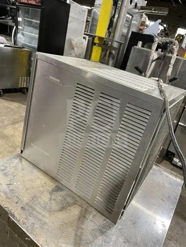 Ice O Matic Elevation Series 22" commercial ice machine, model IM0320HA, air-cooled, half dice cube style, 115V, used.