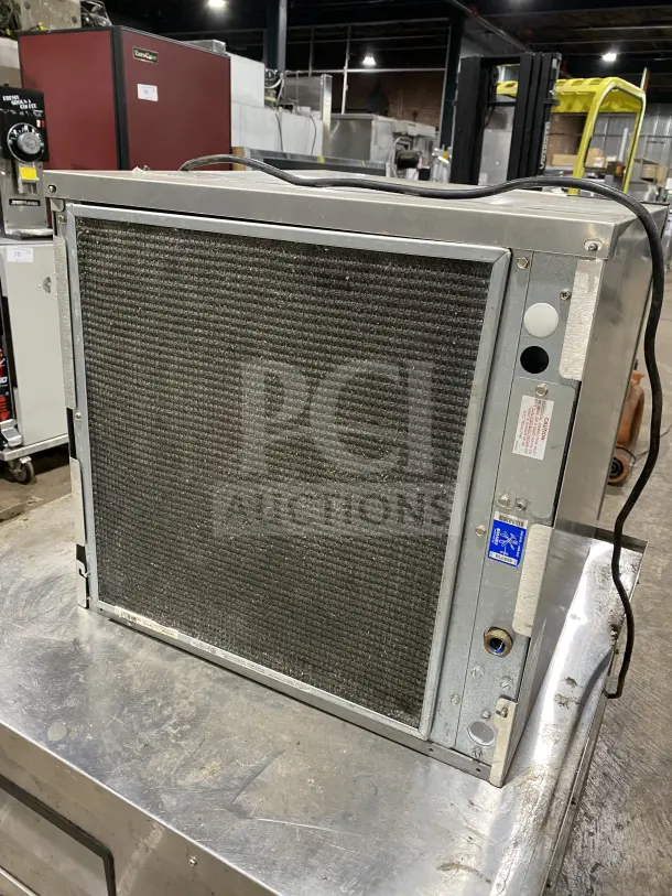 Ice O Matic Elevation Series commercial ice machine, model IM0320HA. Air-cooled, 22", half dice cube, 115V, good condition.