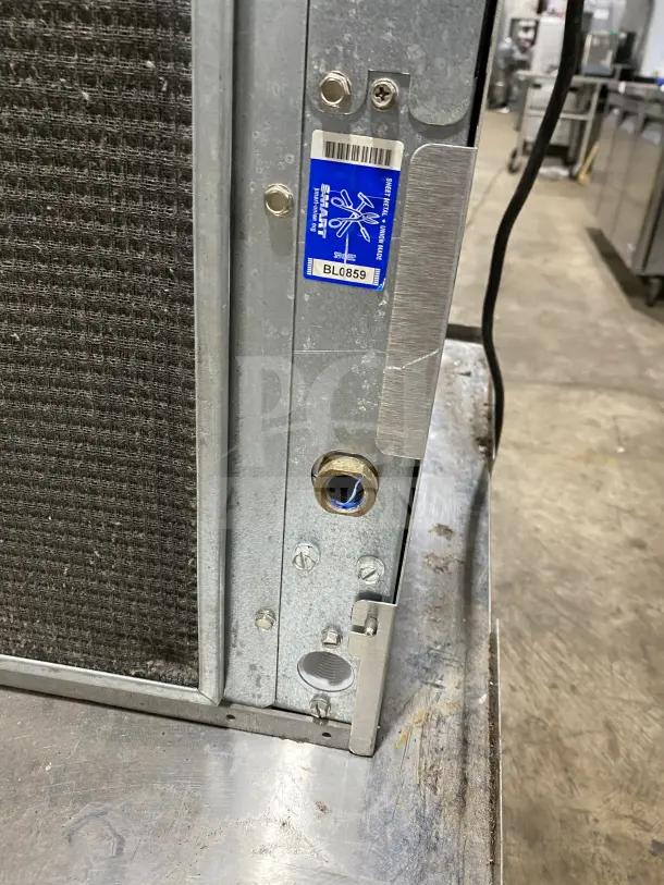 Ice O Matic Elevation Series IM0320HA 22" commercial ice machine; visible serial label, robust metal construction.