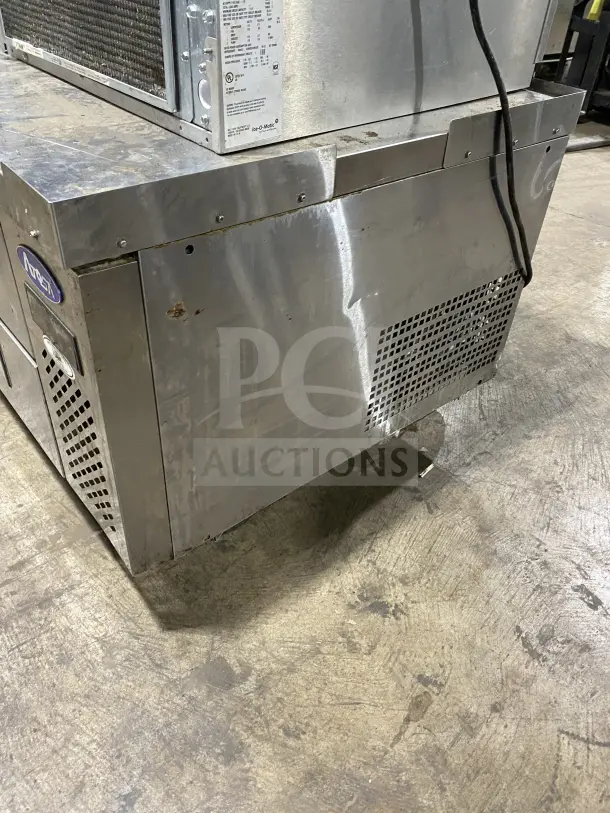 Atosa stainless steel chef base refrigerator, Model MGF8448GR, on casters. Electric, 115V, some surface wear visible.