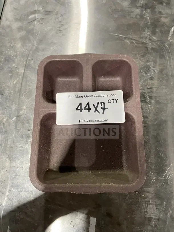 Commercial plastic 3-compartment condiment organizer. Brown, used condition. Label reads "44X7 QTY," PCI Auctions.