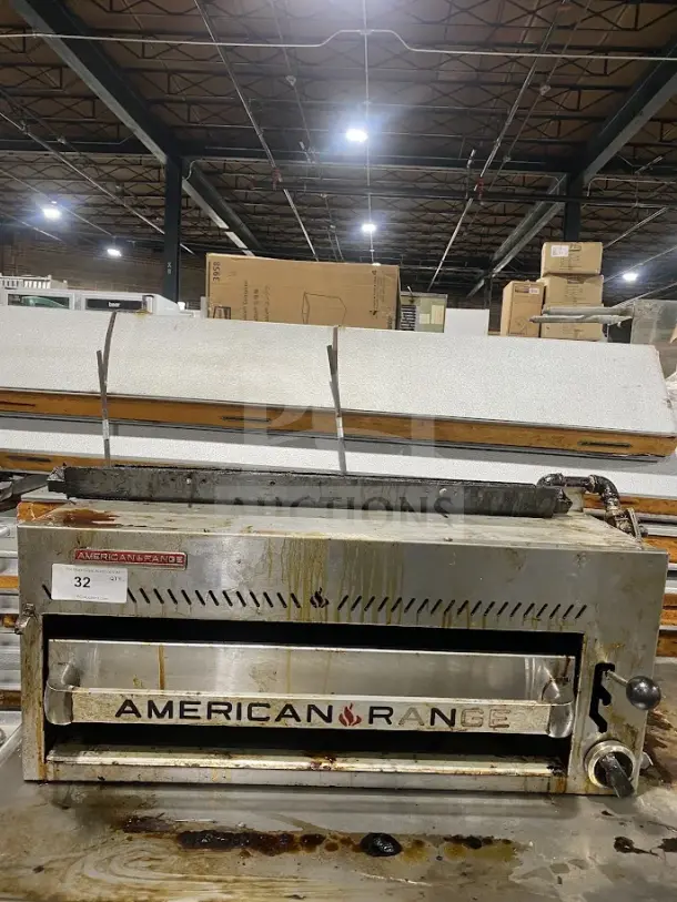 American Range stainless steel salamander broiler, used condition, countertop model. Features front controls and branding label.